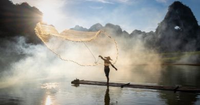 7. fisherman doing fishing with net